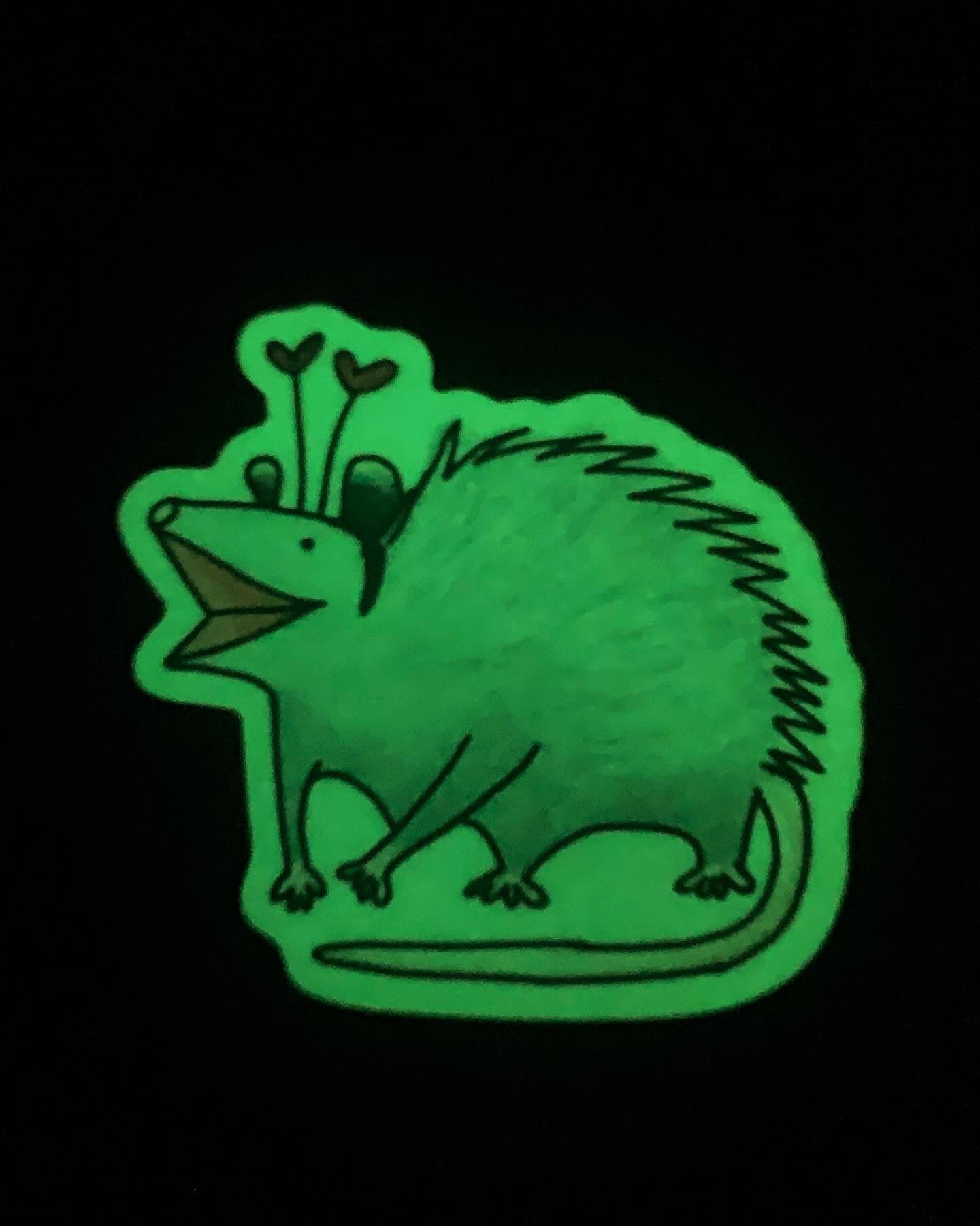 An Opossum that Glows sticker